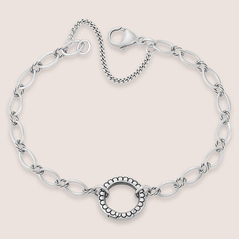 Sterling silver ornate changeable charm bracelet.